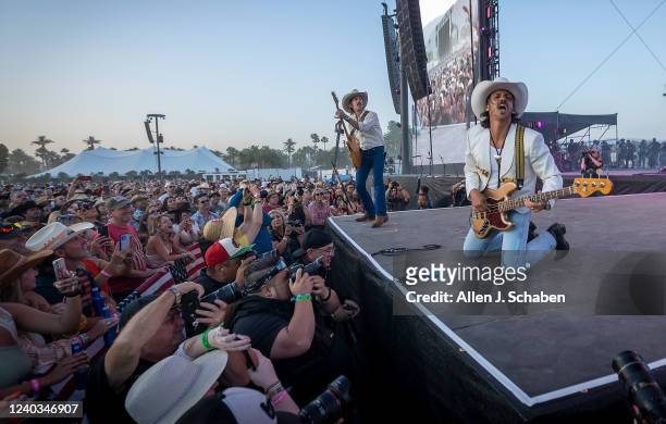 Midland performs at sunset on the Mane Stage on the first day of the three-day Stagecoach Country Music Festival at the Empire Polo Fields, Indio...
