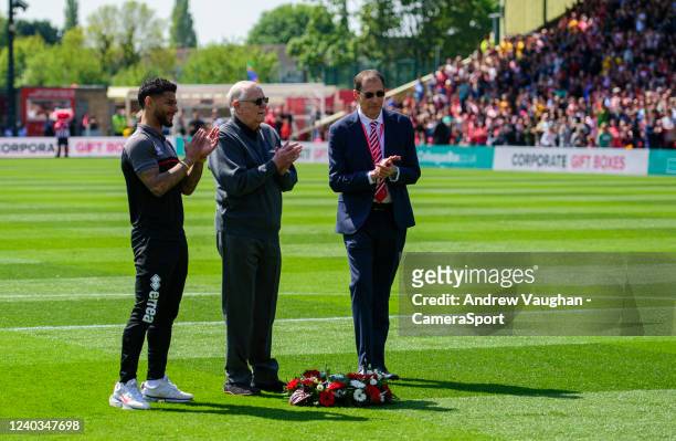 Lincoln City's Liam Bridcutt, Trevor Stacey and Clive Nates lay a wreath in memory of the victims of the Bradford Fire prior to the Sky Bet League...