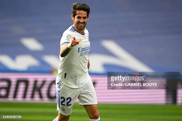 Real Madrid's Spanish midfielder Isco celebrates during the Spanish League football match between Real Madrid CF and RCD Espanyol at the Santiago...