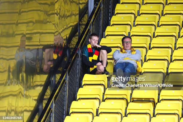Watford fans look disappointed after another loss at home during the Premier League match between Watford and Burnley at Vicarage Road on April 30,...