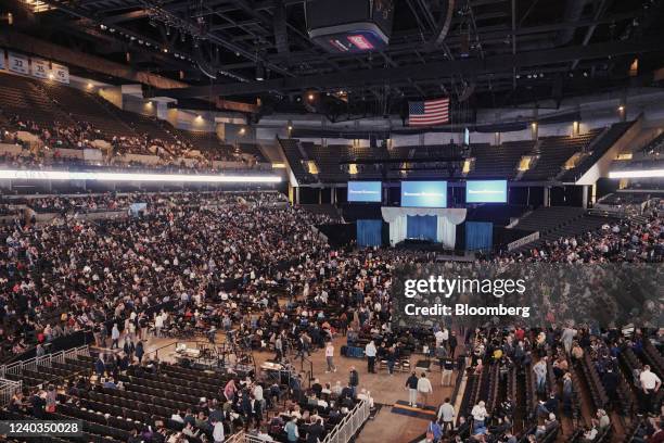 Attendees find their seats during the Berkshire Hathaway annual meeting in Omaha, Nebraska, U.S., on Saturday, April 30, 2022. After hanging in the...