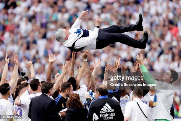 Coach Carlo Ancelotti of Real Madrid celebrates the La Liga championship with the trophy during the La Liga Santander match between Real Madrid v...