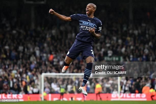 Manchester City's Brazilian midfielder Fernandinho celebrates after scoring their fourth goal during the English Premier League football match...