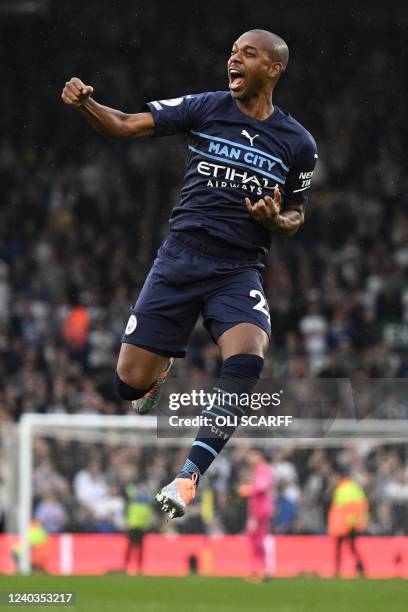 Manchester City's Brazilian midfielder Fernandinho celebrates after scoring their fourth goal during the English Premier League football match...