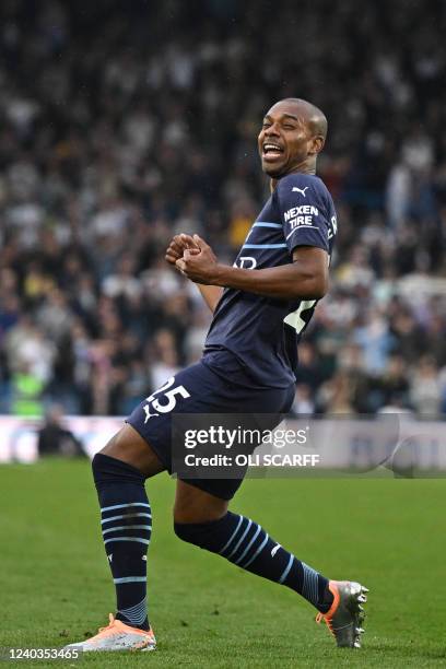 Manchester City's Brazilian midfielder Fernandinho celebrates after scoring their fourth goal during the English Premier League football match...