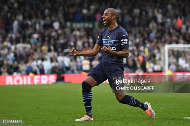 Manchester City's Brazilian midfielder Fernandinho celebrates after scoring their fourth goal during the English Premier League football match...