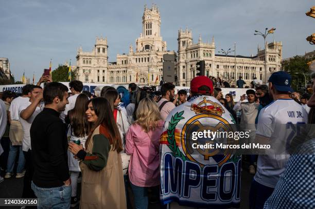 Real Madrid fans in Plaza de Cibeles celebrating the 35th La Liga national title that Real Madrid team won following their victory in a match against...