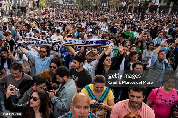 Large crowd of Real Madrid fans celebrating in Plaza de Cibeles the 35th La Liga national title that Real Madrid team won following their victory in...