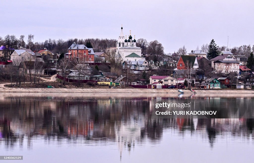 Fkdi Cottages and a church are seen reflected in the Volga river in... News ...