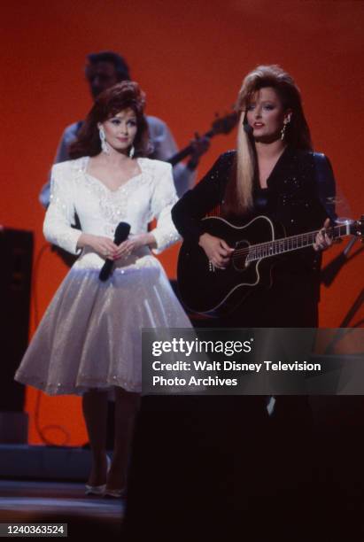 Los Angeles, CA Naomi Judd, Wynonna Judd, The Judds performing 'Calling in the Wind' on the ABC tv special 'The 17th Annual American Music Awards',...