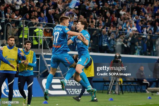 Daler Kuzyaev , Andrei Mostovoy of Zenit seen during the Russian Premier League football match between Zenit Saint Petersburg and Lokomotiv Moscow at...