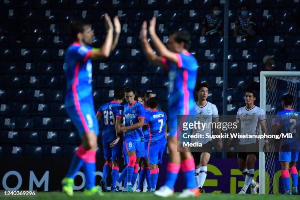 Dejan Damjanović of Kitchee SC celebrates with teammates after scoring his team's first goal during the AFC Champions League Group J match between...