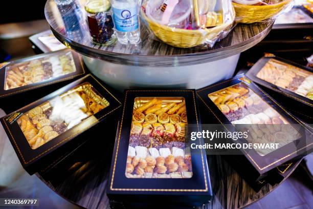 This photograph taken in the Hague on May 1, 2022 shows pastries displayed in the Moroccan bakery Marrakesh as Muslims celebrate Eid al-Fitr which...