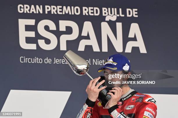 Ducati Italian rider Francesco Bagnaia celebrates with the trophy on the podium after winning the MotoGP race of the Spanish Grand Prix at the Jerez...