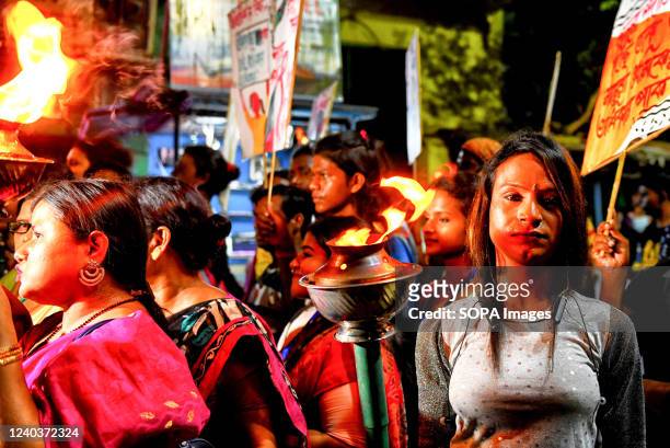 Transgender sex worker poses for a photo during the eve of International Labor Day. Sex workers of Sonagachi Kolkata, the Largest Red light area of...