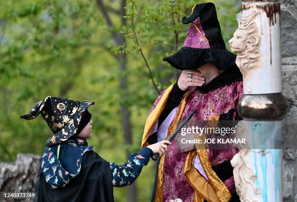 Family attends Walpurgis Night ceremony near Plankenstein Castle, Austria, on April 30, 2022. - Walpurgisnacht , usually celebrated on April 30 or...