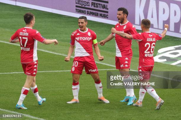 Monaco's French forward Wissam Ben Yedder celebrates with Monaco's German forward Kevin Volland after scoring a goal during the French L1 football...