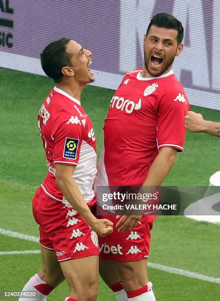 Monaco's French forward Wissam Ben Yedder celebrates with Monaco's German forward Kevin Volland after scoring a goal during the French L1 football...