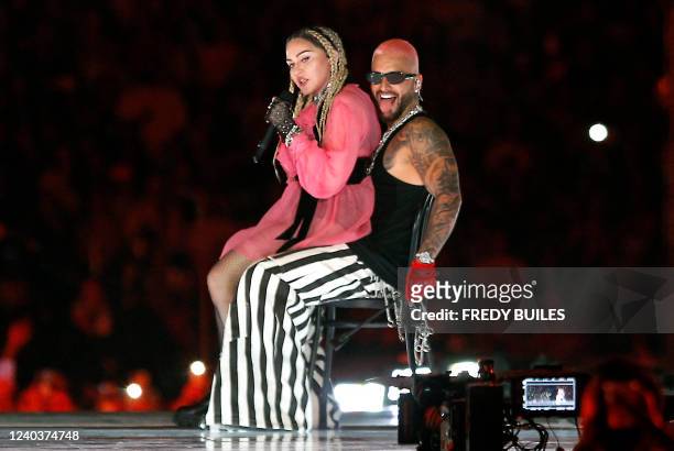 Colombian singer Maluma performs on stage along with pop icon Madonna during his concert "Medallo in the Map", in Medellin, Colombia, on April 30,...