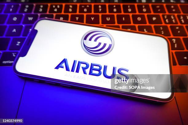 In this photo illustration, an Airbus Group logo is displayed on the screen of a smartphone in this photo illustration.