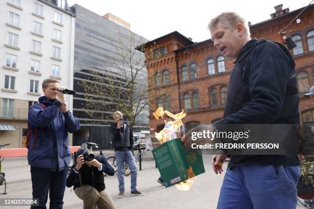 Leader of the anti-immigration and anti-Islam group Hard Line, Danish-Swedish right-wing extremist Rasmus Paludan burns a Koran at the Northern...