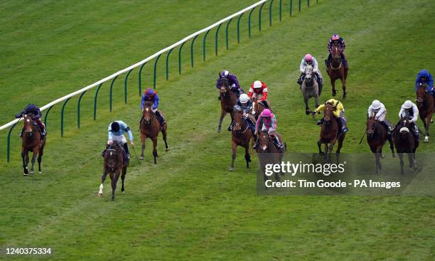 Cachet ridden by jockey James Doyle lead on their way to winning the Qipco 1000 Guineas Stakes on day three of the QIPCO Guineas Festival at...