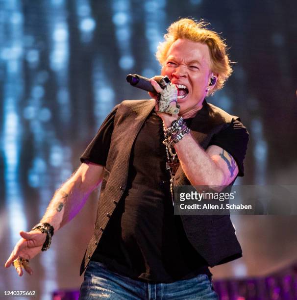 Guns n Roses lead singer Axl Rose makes a surprise appearance with Saturdays headliner Carrie Underwood, not pictured, to sing a pair of the groups...