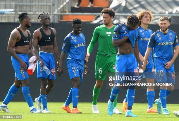 Reims' French defender Andrew Gravillon, Reims' French defender Banzouzi Locko, Reims' Dutch midfielder Azor Matusiwa, Reims' French defender Andrew...