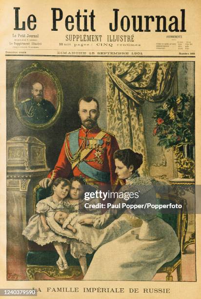 Vintage cover illustration featuring Tsar Nicholas II, with his wife, Tsarina Alexandra and three of their children, Olga. Tatiana and Marie, and...
