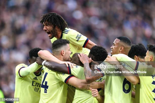 Mohamed Elneny of Arsenal celebrates their first goal during the Premier League match between West Ham United and Arsenal at London Stadium on May 1,...