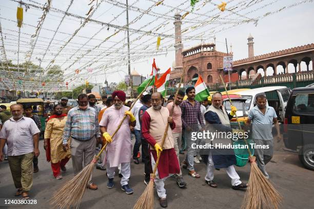 Former Union Minister and Bharatiya Janata Party leader Vijay Goel along with North Delhi Mayor Raja Iqbal Singh leads a Swachata Abhiyan outside...