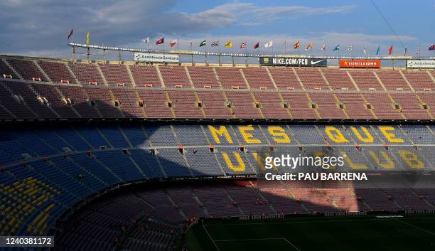 Barcelona's lemma "More than a club" is seen on the empty grandstands of the stadium before the Spanish League football match between FC Barcelona...