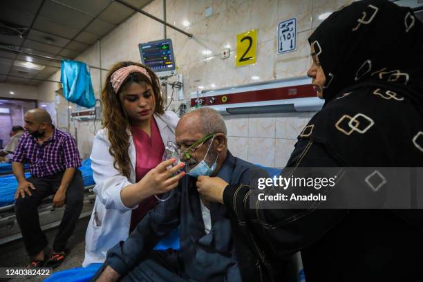 People receive treatment for respiratory problems at a hospital following a heavy sandstorm in Baghdad, Iraq on May 01, 2022