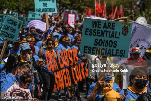 Workers participate in a May Day rally in Manhattan on May 1, 2022 in New York City. Amazon workers recently unionized a facility in Staten Island...