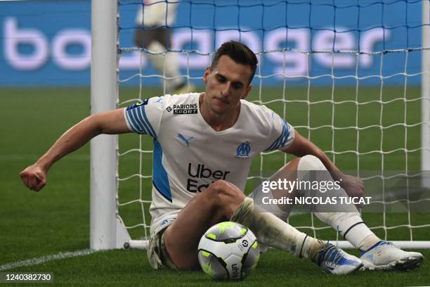 Marseille's Polish forward Arkadiusz Milik reacts during the French L1 football match between Olympique Marseille and Olympique Lyonnais at Stade...