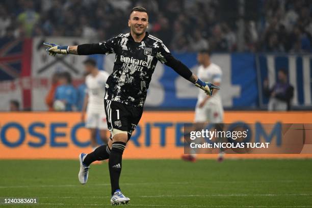 Lyon's Portuguese goalkeeper Anthony Lopes celebrates his team's first goal during the French L1 football match between Olympique Marseille and...