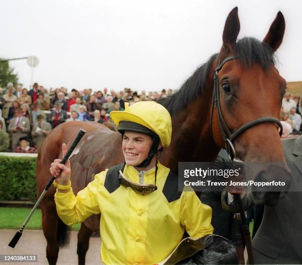 Australian jockey Craig Williams and Tobougg after winning The Dewhurst Stakes at Newmarket Rowley Mile Racecourse, 14th October 2000.