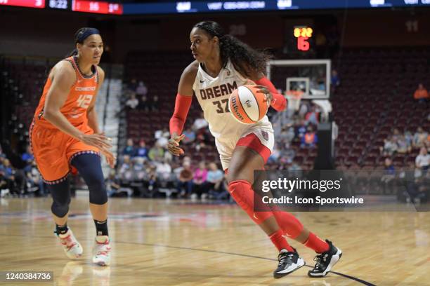 Atlanta Dream forward Cheyenne Parker drives towards the basket from the perimeter during a WNBA game between the Atlanta Dream and Connecticut Sun...