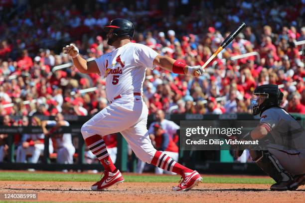 Albert Pujols of the St. Louis Cardinals hits an RBI single against the Arizona Diamondbacks in the sixth inning at Busch Stadium on May 1, 2022 in...