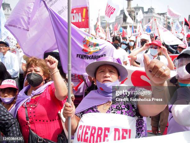 Indigenous women from the Federation of Peasant Women protesting when hundreds of unionists took Dos de Mayo square in Lima, in front of the...