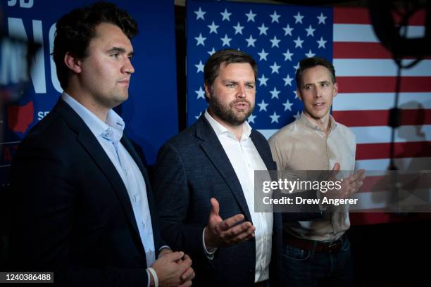 Conservative activist Charlie Kirk, J.D. Vance, a Republican candidate for U.S. Senate in Ohio, and Sen. Josh Hawley speak with reporters at a...