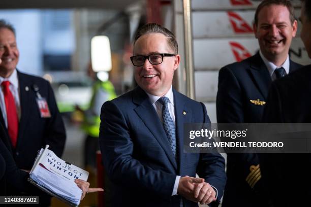 Chief Executive Officer of Qantas Airways Alan Joyce gestures during the ceremony of an Airbus A350-1000 aircraft fleet announcement at Sydney...