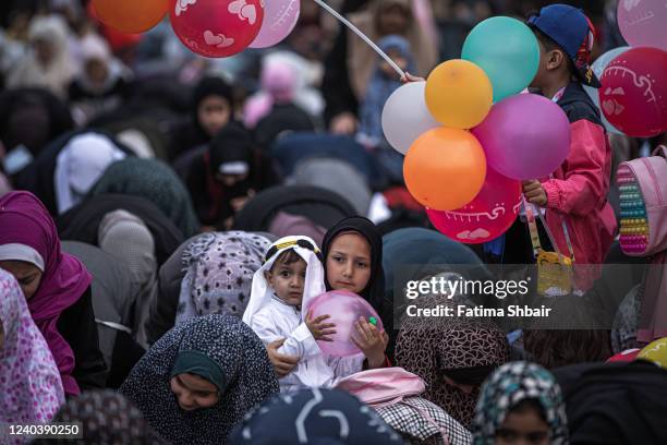 May 02: Palestinian Muslims attend the morning Eid al-Fitr prayer, marking the end of the holy fasting month of Ramadan in Gaza City on May 2, 2022...