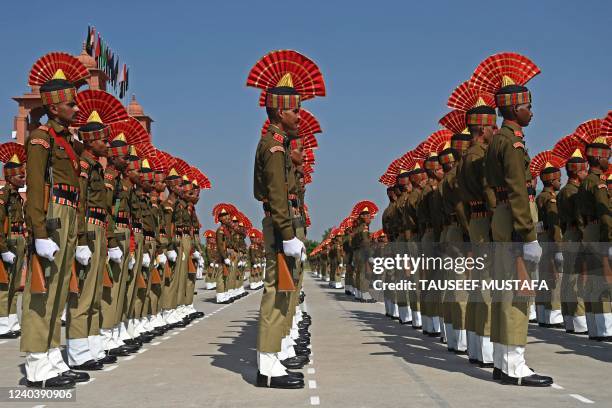 Indian Border Security Force new recruits take part in a passing-out parade in Humhama on the outskirts of Srinagar on May 2, 2022.