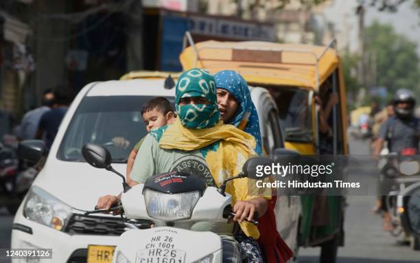 Commuters out on a hot summer day at Khandsa Road, near DAV High School, on May 1, 2022 in Gurugram, India.