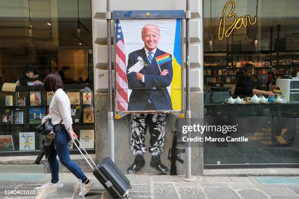 The president of the United States of America, Joe Biden, depicted in the work of the Neapolitan street artist, Eduardo Castaldo, as half pacifist...