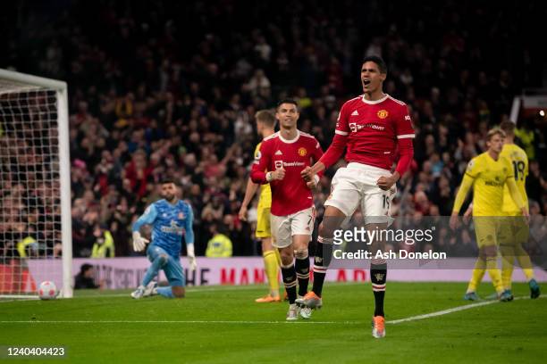 Raphael Varane of Manchester United celebrates scoring a goal to make the score 3-0 during the Premier League match between Manchester United and...