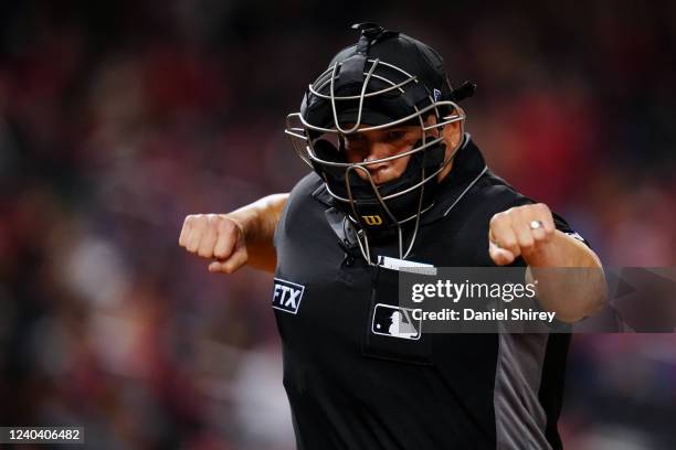 Umpire Mark Carlson makes a strike out call during the game between the New York Mets and the Washington Nationals at Nationals Park on Thursday,...