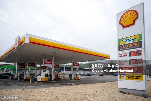 Fuel prices are displayed at a Shell petrol station on Hadfield Road on May 2, 2022 in Cardiff, Wales. Energy and fuel bills are rising in the UK due...