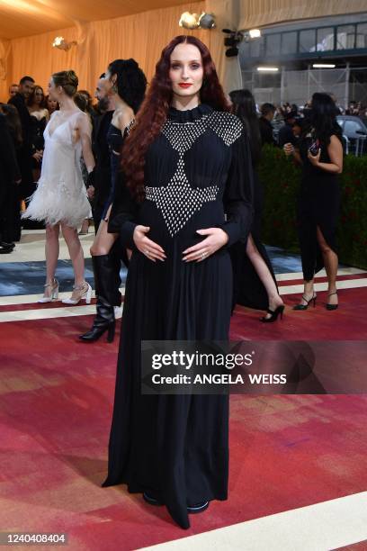 British actress Sophie Turner arrives for the 2022 Met Gala at the Metropolitan Museum of Art on May 2 in New York. - The Gala raises money for the...